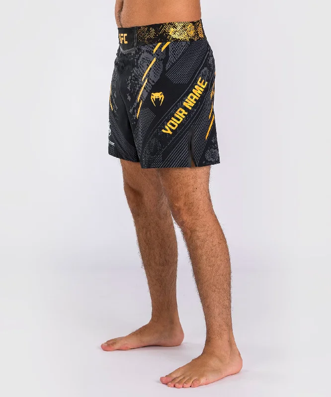 UFC Adrenaline by Venum Personalized Authentic Fight Night Men's Fight Short - Short Fit - Black/Gold Refined Men's Hand