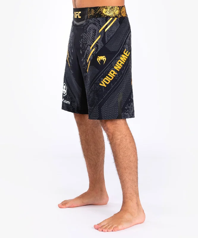 UFC Adrenaline by Venum Personalized Authentic Fight Night Men's Fight Short - Long Fit - Black/Gold Vacation